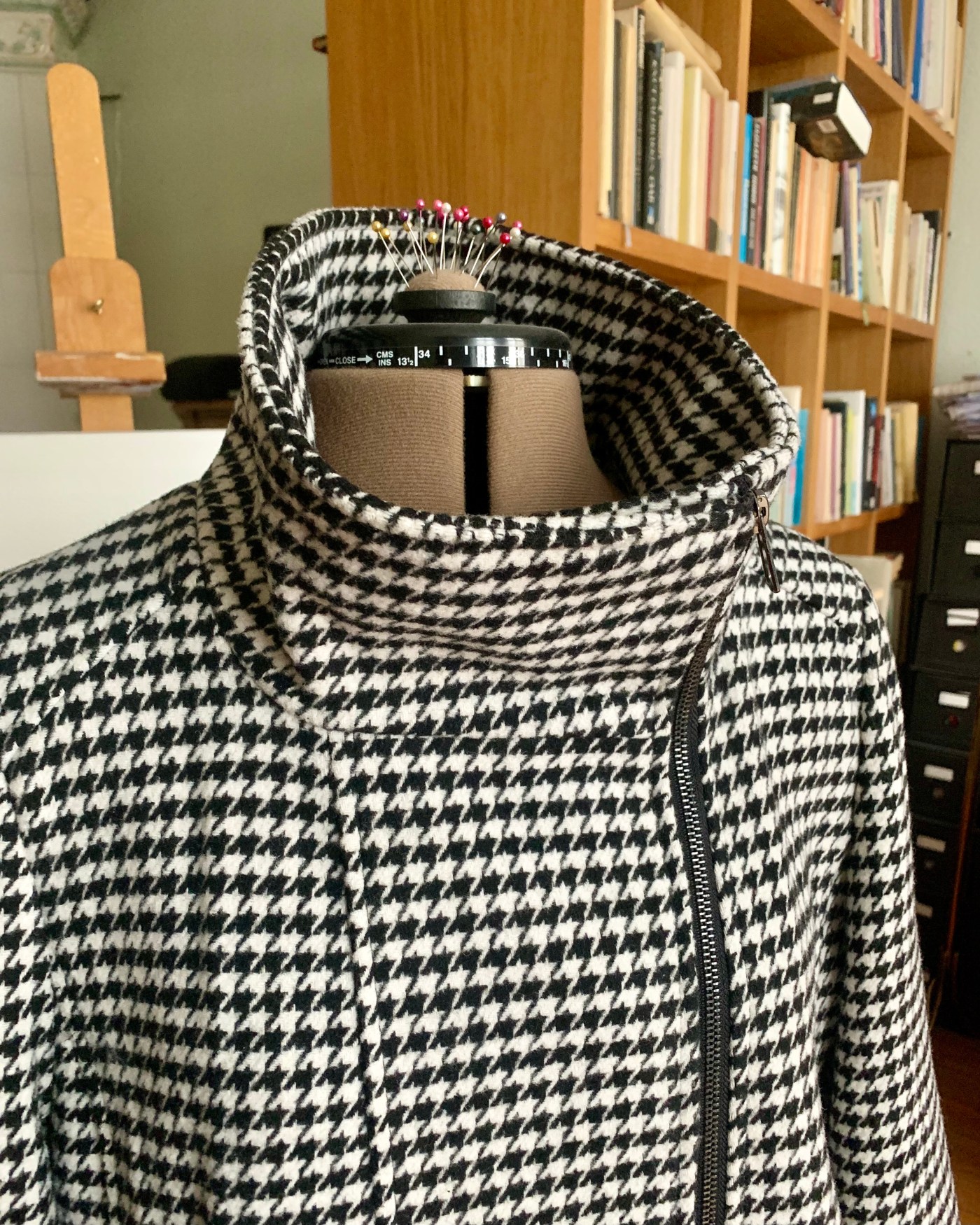 A closeup on a coat under reconstruction