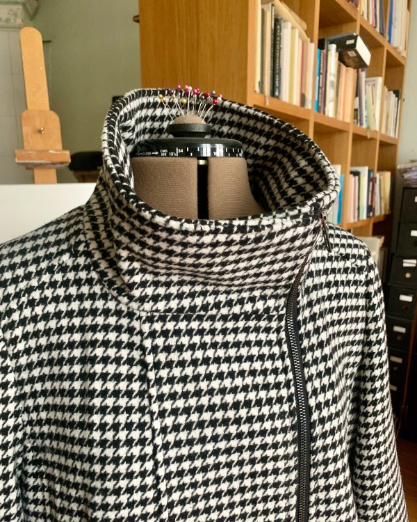 A closeup on a coat under reconstruction